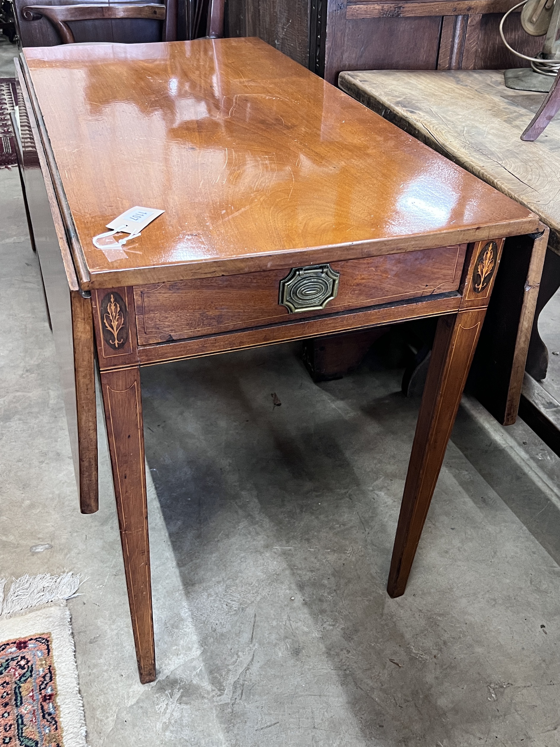 A George III inlaid mahogany Pembroke table, width 107cm, depth 52cm, height 72cm